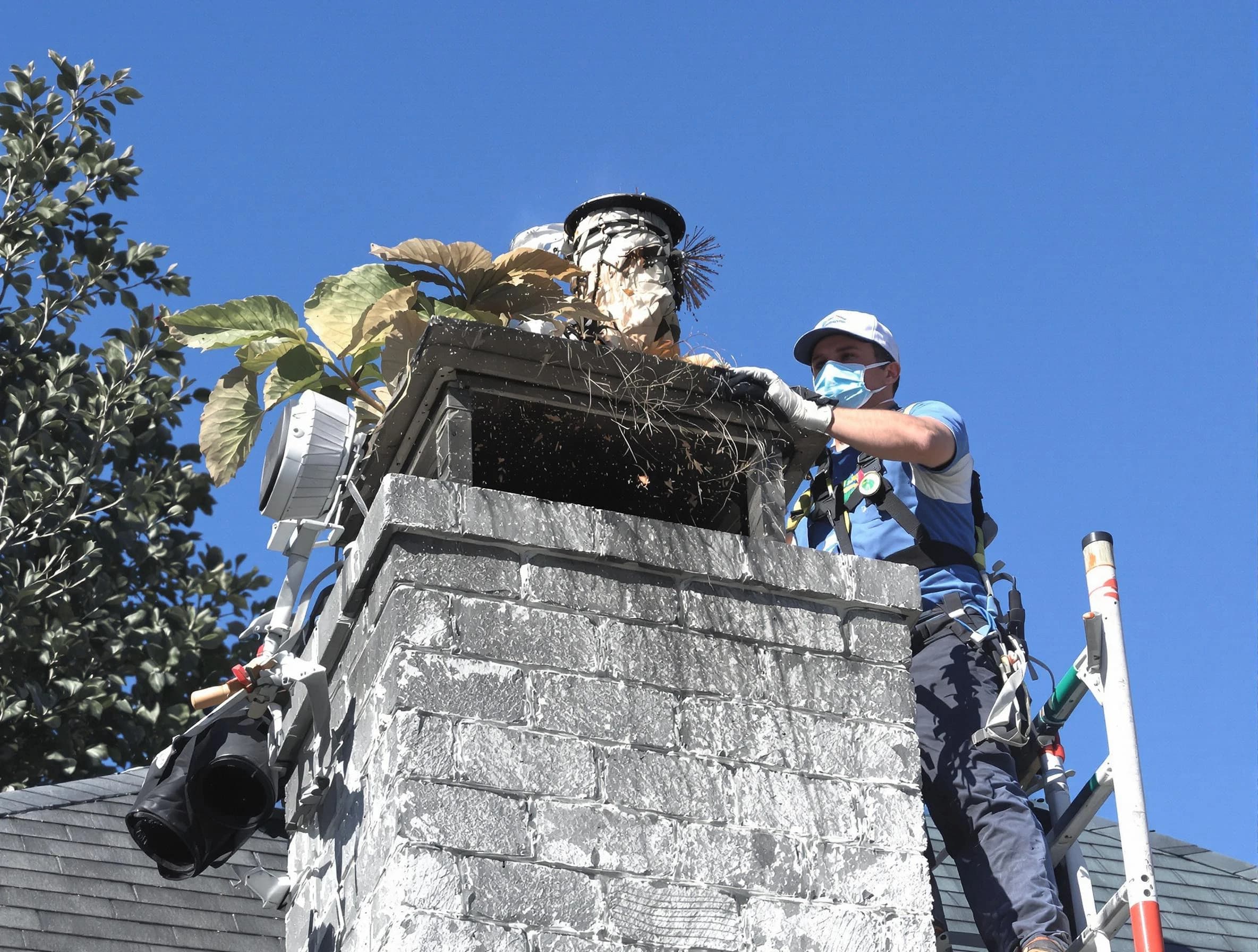 Toms River Chimney Sweep specialist performing chimney cleaning in Toms River, NJ