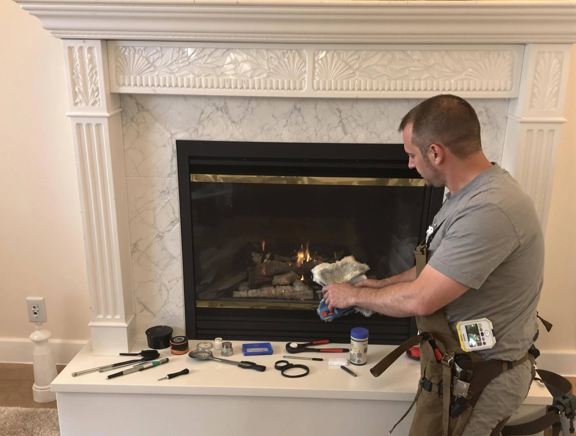 Toms River Chimney Sweep performing fireplace maintenance in Toms River, NJ